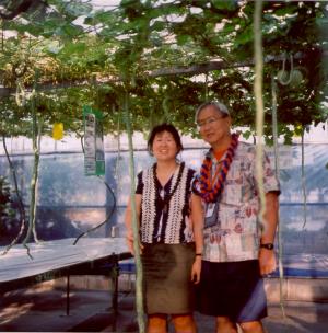 Robert and Leanne Yanabu at a Goya Farm in Okinawa, 2011