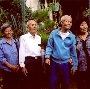 Grandma, Grandpa, his brother and sister