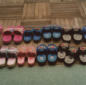 Kindergarteners' slippers lined up neatly